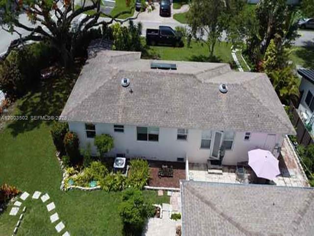 5701 Southwest 50th Terrace Miami, FL 33155 - Photo 3 of 46 a aerial view of a house with a yard and potted plants