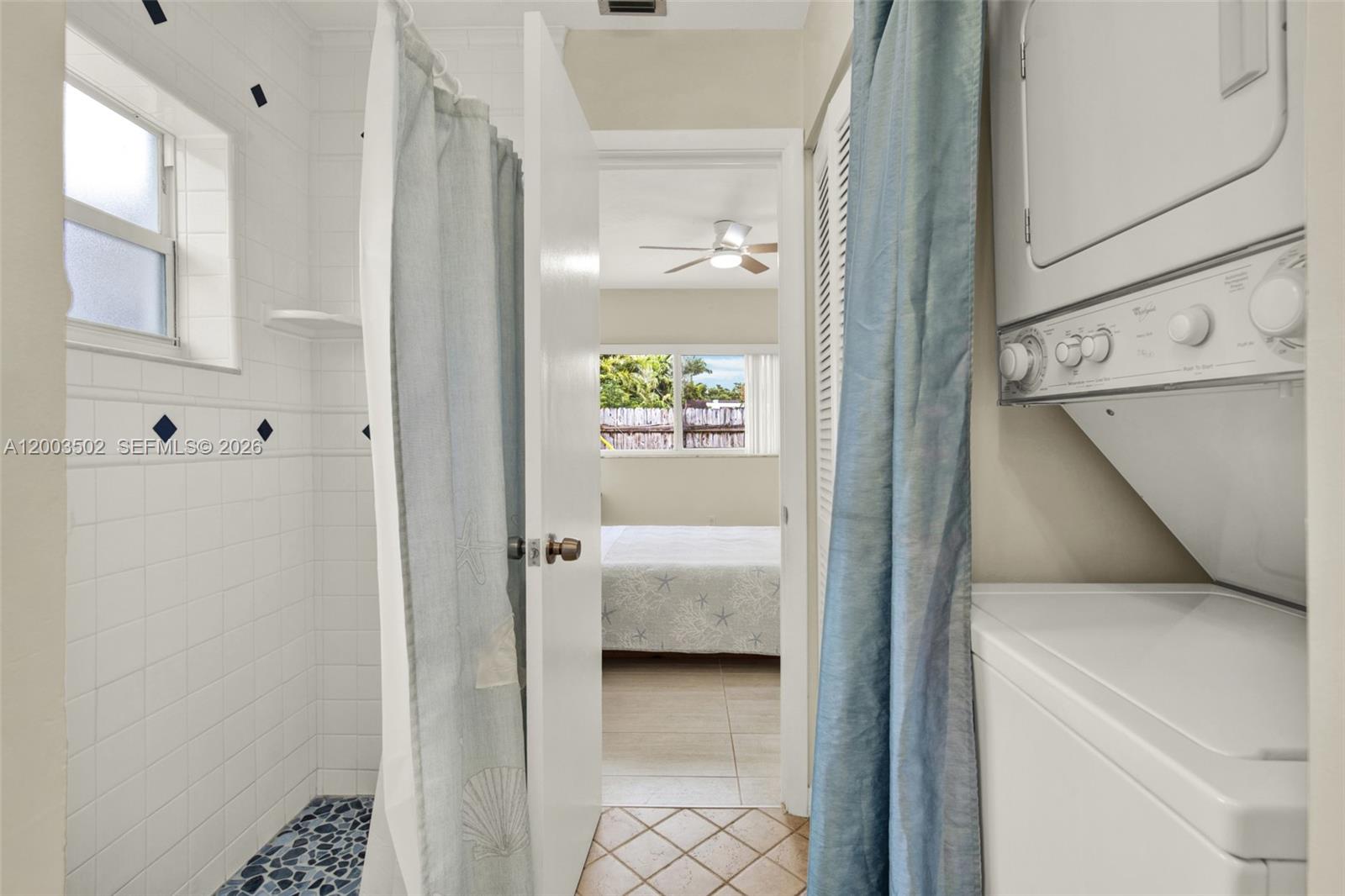 5701 Southwest 50th Terrace Miami, FL 33155 - Photo 34 of 46 a en suite bathroom with a sink and shower