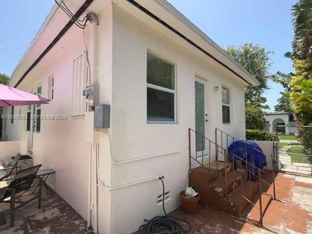 5701 Southwest 50th Terrace Miami, FL 33155 - Photo 35 of 46 a view of a house with backyard and sitting area