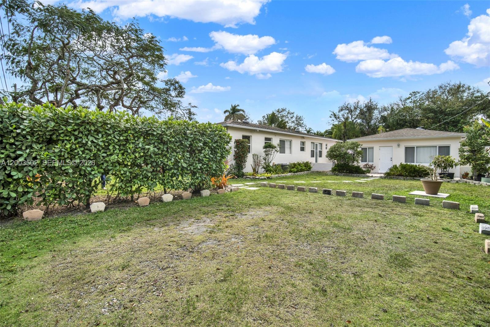 5701 Southwest 50th Terrace Miami, FL 33155 - Photo 38 of 46 a view of a house with a yard