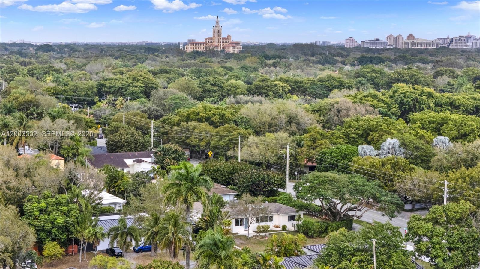 5701 Southwest 50th Terrace Miami, FL 33155 - Photo 41 of 46 an aerial view of residential houses with outdoor space and trees