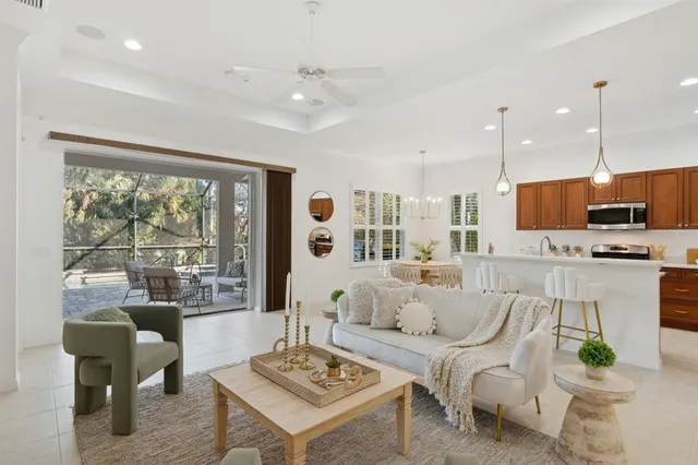 a living room with furniture and a table