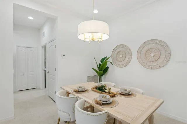 a spacious bedroom with a bed and a couch