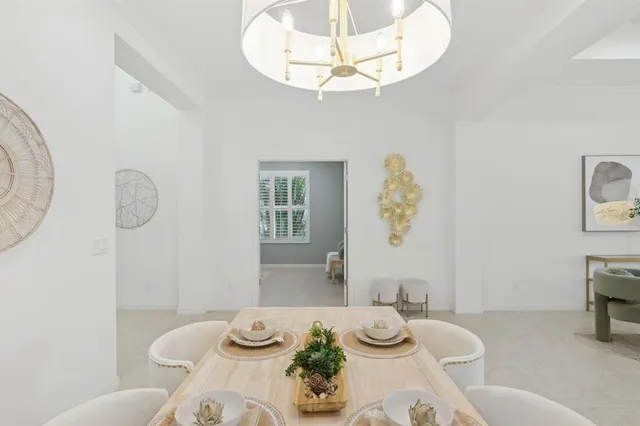 a bedroom with a bed and a lamp