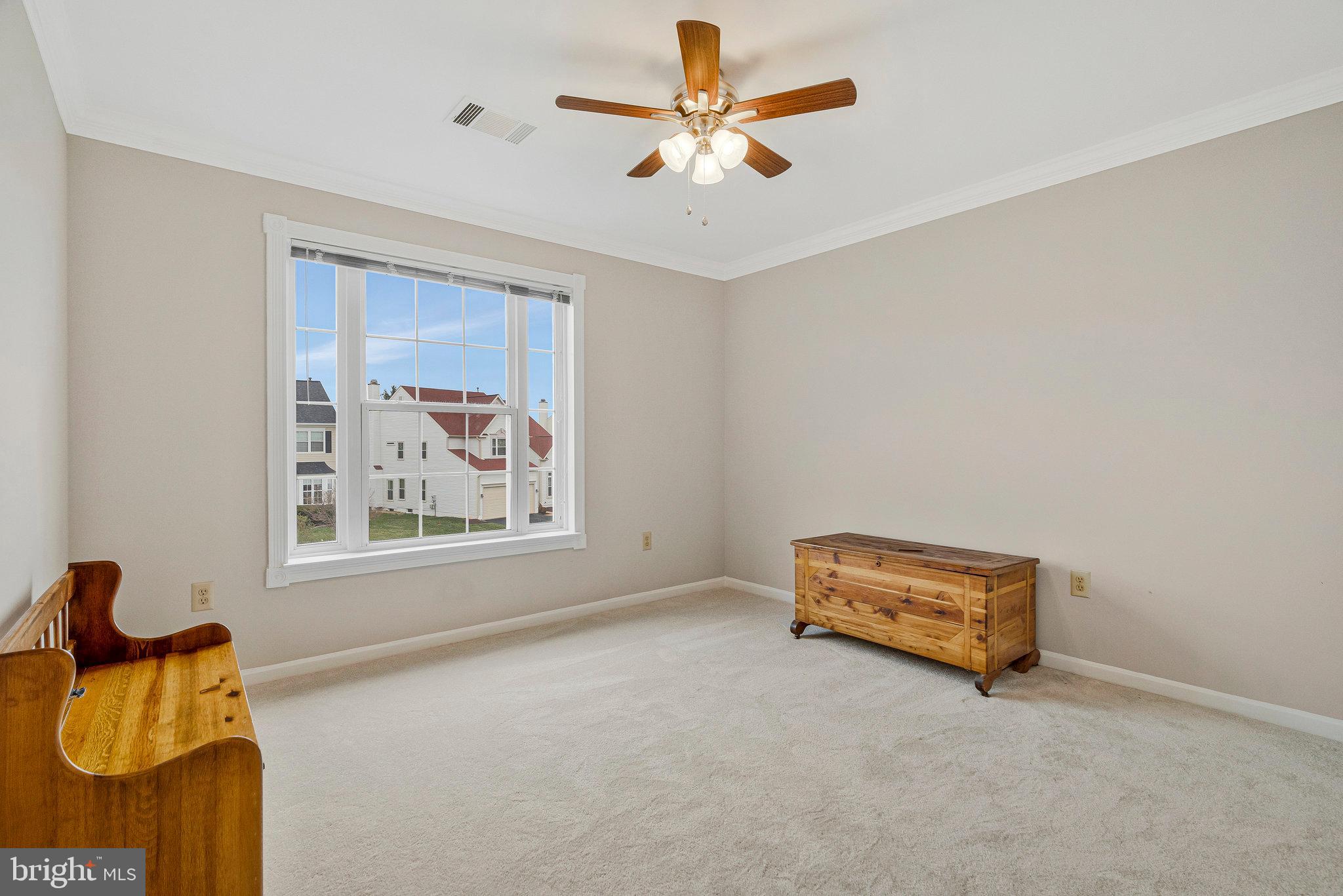 21272 Rosetta Place Ashburn, VA 20147 - Photo 39 of 58 a living room with furniture and a window