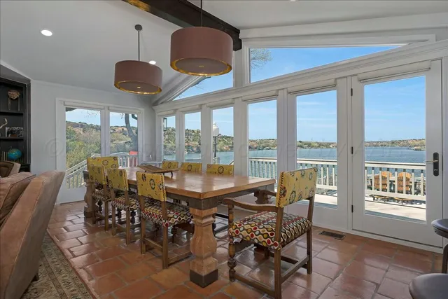 a spacious bedroom with a large bed and a couch