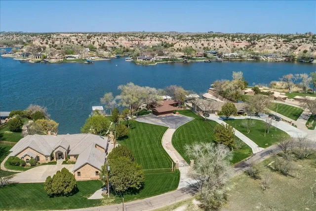 a view of a park with large trees