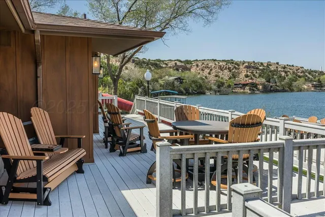 a view of a porch with wooden floor