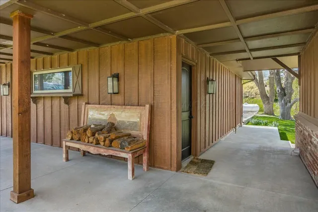 an aerial view of a houses with a lake view