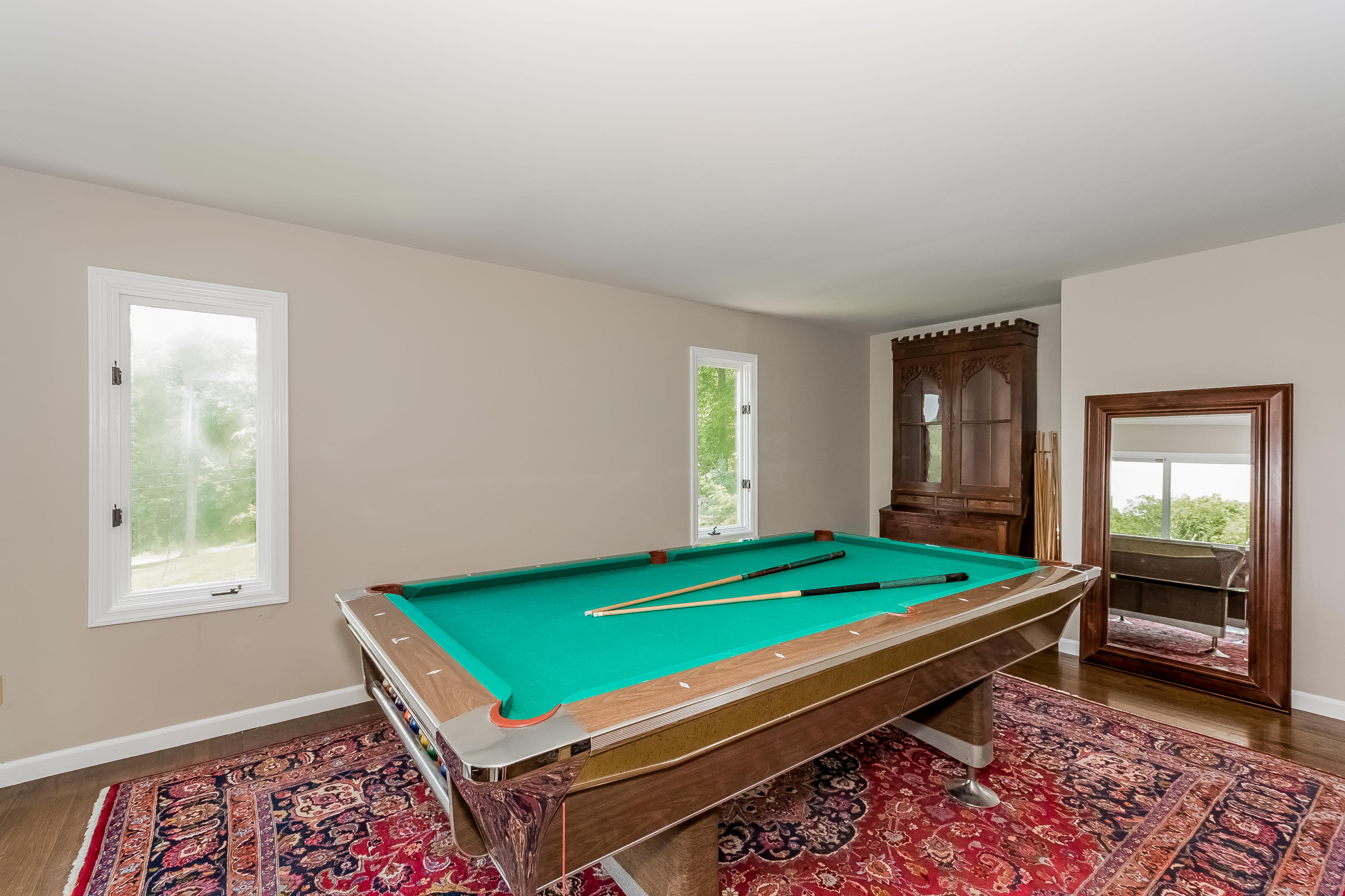 17 Bayberry Hill Road Ridgefield, CT 06877 - Photo 12 of 50 a room with pool table and windows