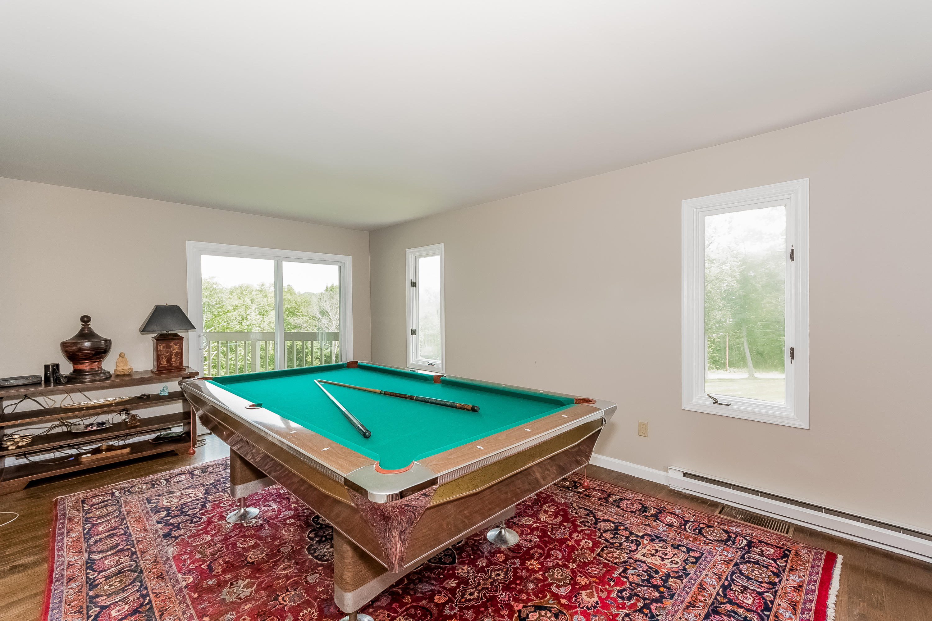 17 Bayberry Hill Road Ridgefield, CT 06877 - Photo 13 of 50 a room with pool table and windows