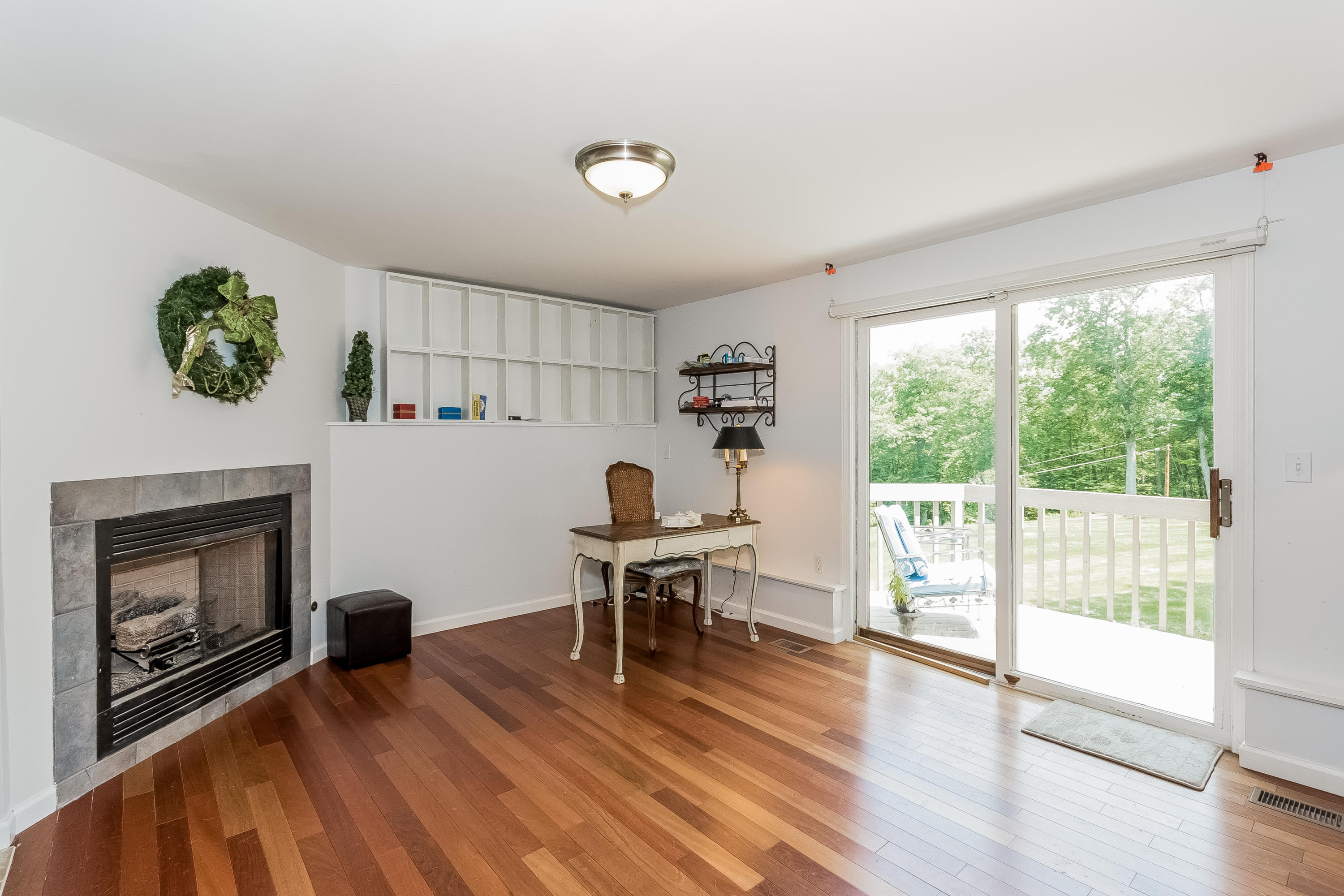 17 Bayberry Hill Road Ridgefield, CT 06877 - Photo 38 of 50 a work room with furniture and a wooden floor