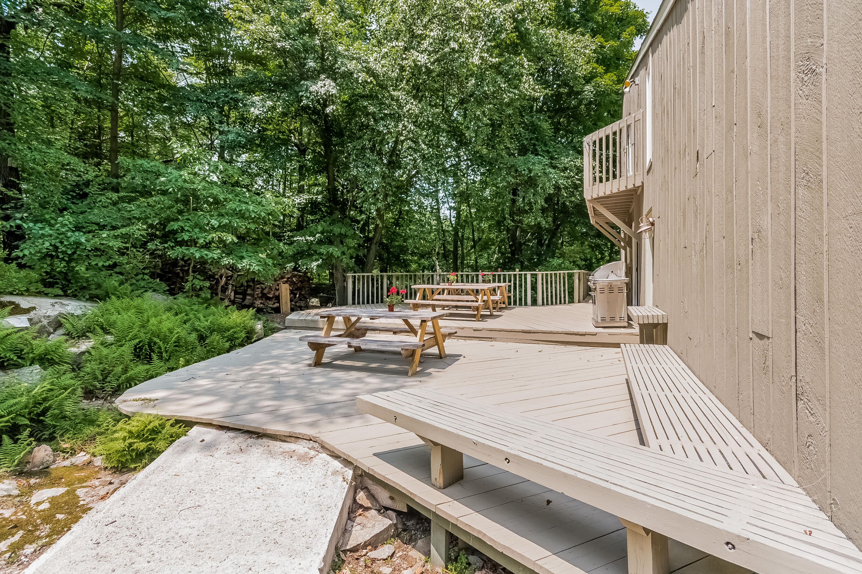 17 Bayberry Hill Road Ridgefield, CT 06877 - Photo 42 of 50 a view of backyard with a table and chairs under an umbrella