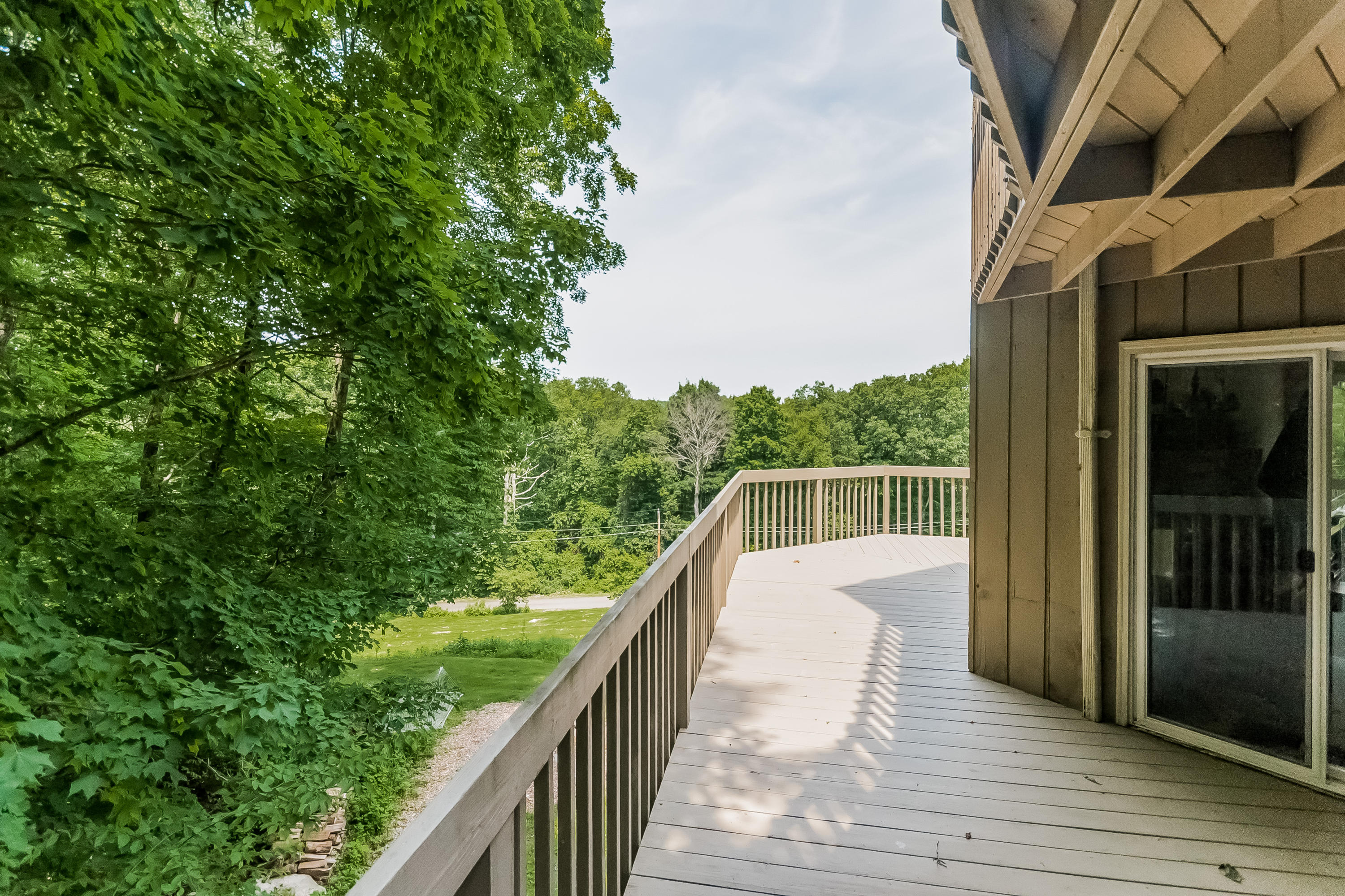 17 Bayberry Hill Road Ridgefield, CT 06877 - Photo 44 of 50 a view of balcony with wooden floor and fence