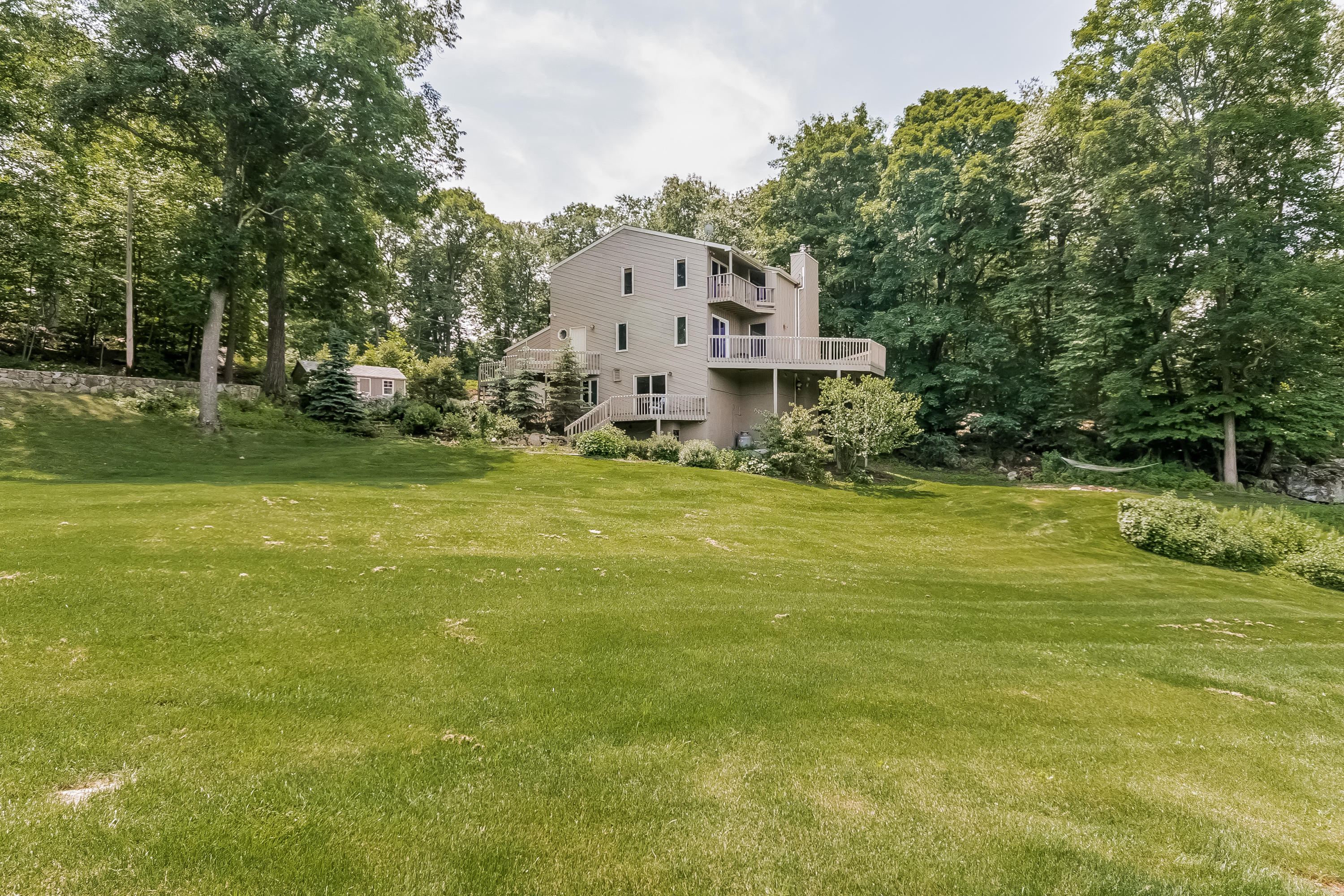 17 Bayberry Hill Road Ridgefield, CT 06877 - Photo 47 of 50 a view of a house with a big yard