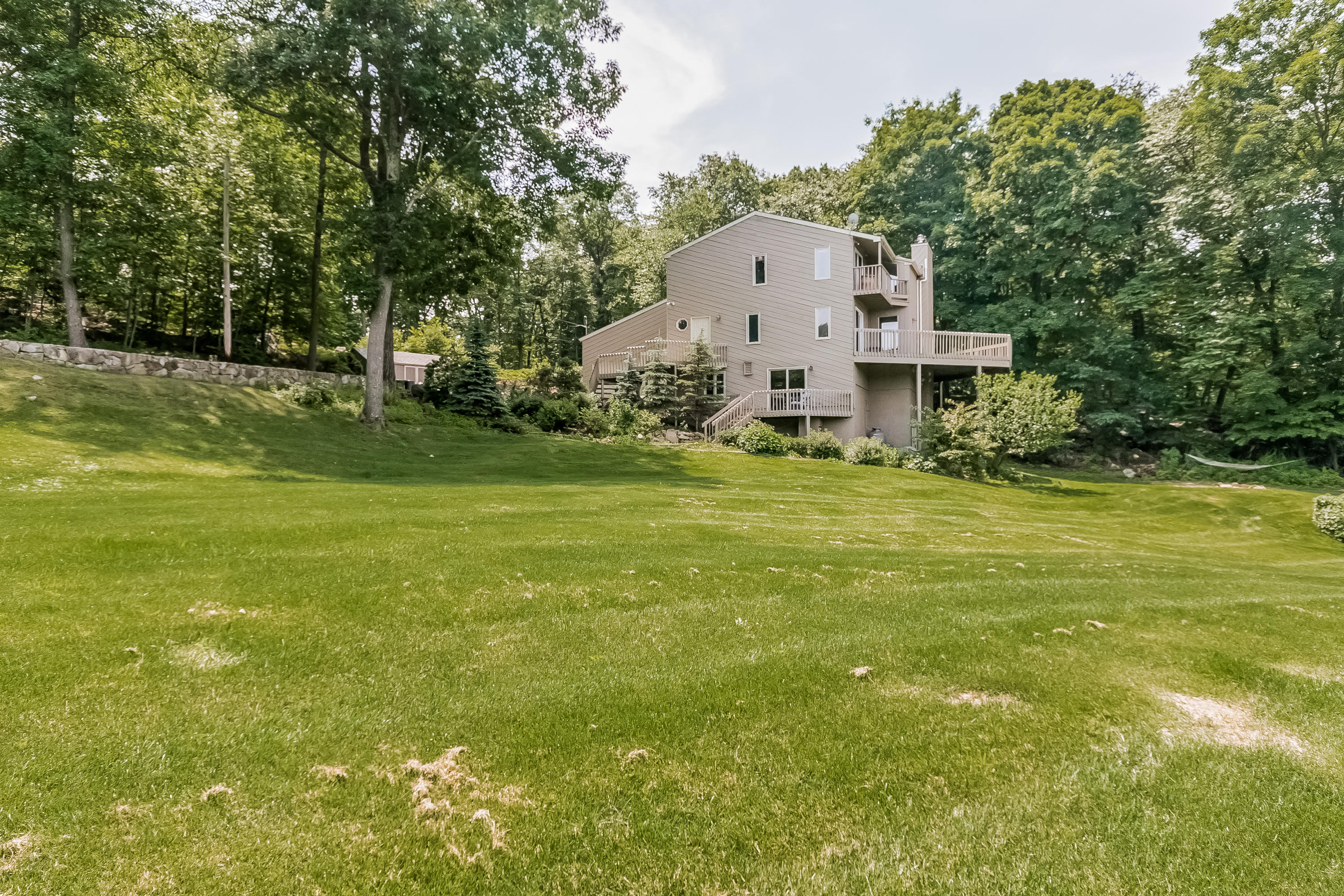 17 Bayberry Hill Road Ridgefield, CT 06877 - Photo 6 of 50 a view of a house with a big yard
