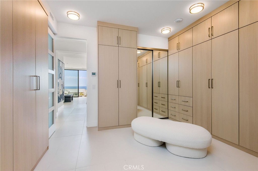 11 Seabreeze Terrace Dana Point, CA 92629 - Photo 17 of 46 a bathroom with a tub and shower