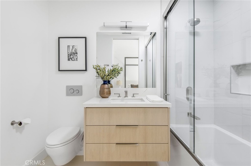 11 Seabreeze Terrace Dana Point, CA 92629 - Photo 21 of 46 a bathroom with a sink toilet and shower