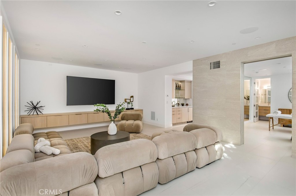 11 Seabreeze Terrace Dana Point, CA 92629 - Photo 30 of 46 a living room with furniture and a flat screen tv