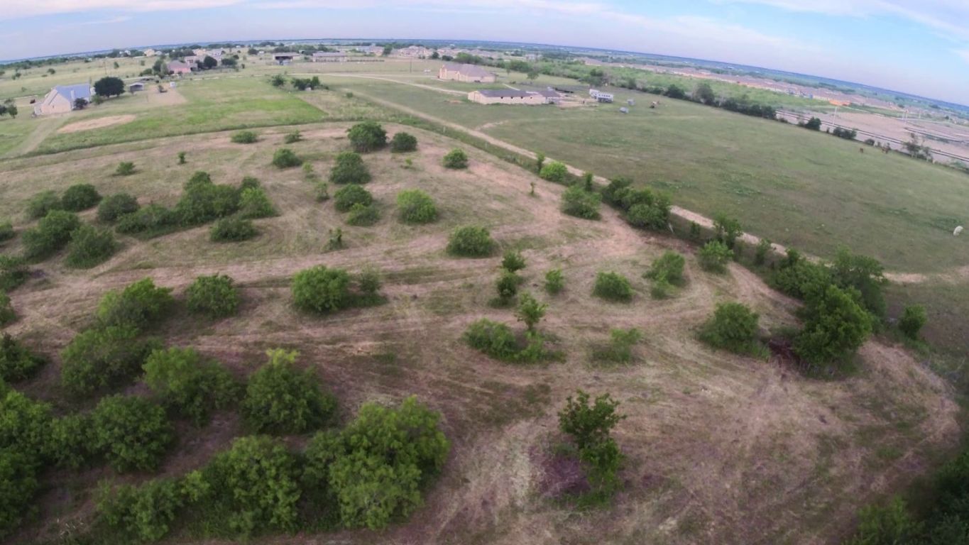 13706 1/2 Bois-D-Arc Road Manor, TX 78653 - Photo 3 of 11 an aerial view of mountains with green space