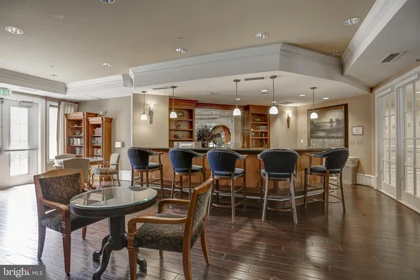 a view of a dining area with furniture window and wooden floor