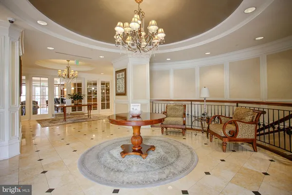 a very nice looking dining room with a table and chairs