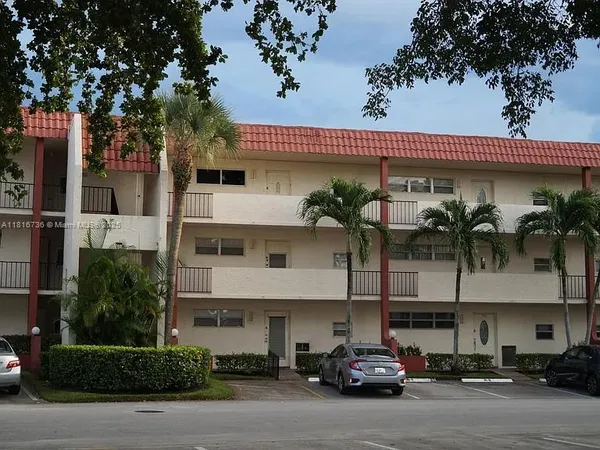 a car parked in front of a building