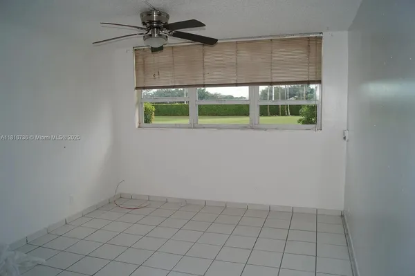an empty room with a window