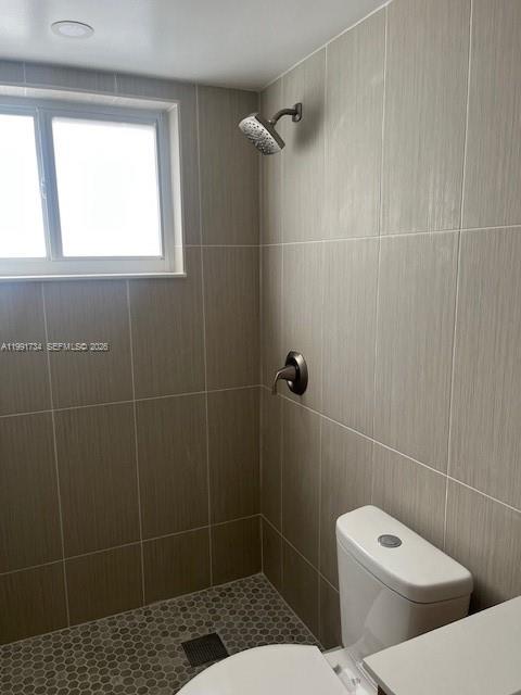 1151 West 28th Street, Unit 1 Hialeah, FL 33010 - Photo 13 of 25 a bathroom with a toilet and a shower
