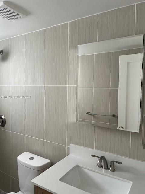 1151 West 28th Street, Unit 1 Hialeah, FL 33010 - Photo 14 of 25 a bathroom with a sink a toilet and shower