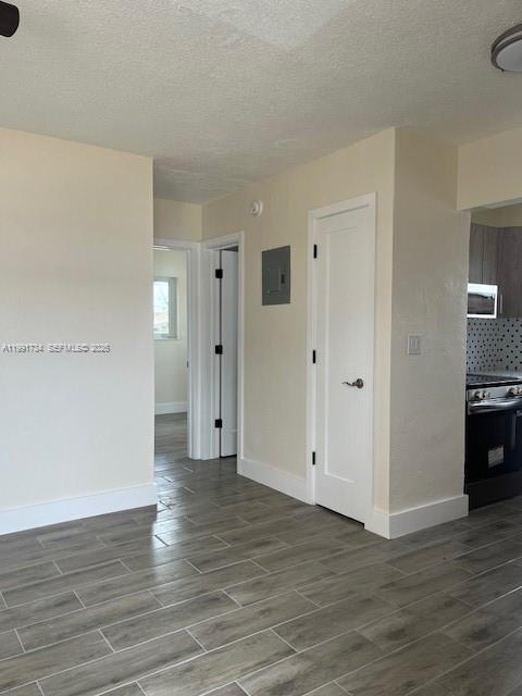 1151 West 28th Street, Unit 1 Hialeah, FL 33010 - Photo 21 of 25 a view of an empty room with wooden floor
