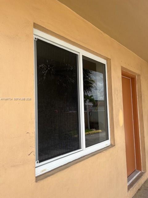 1151 West 28th Street, Unit 1 Hialeah, FL 33010 - Photo 24 of 25 a view of a glass door