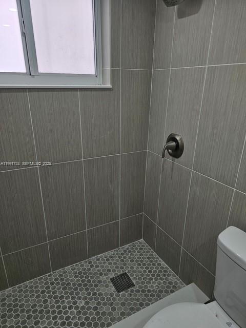 1151 West 28th Street, Unit 1 Hialeah, FL 33010 - Photo 9 of 25 a bathroom with a shower