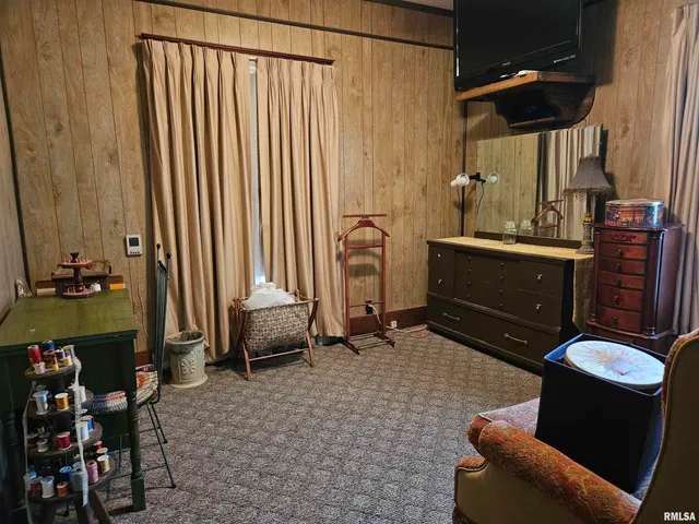 a room with furniture and a chair