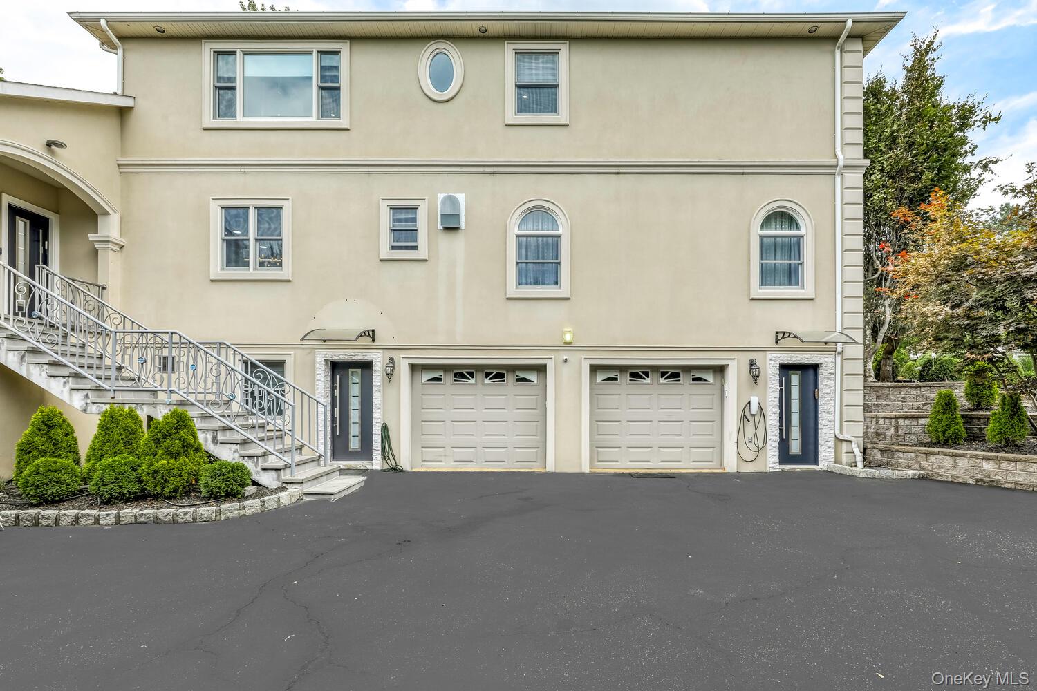 4 Cortland Road Monsey, NY 10952 - Photo 5 of 29 a front view of a building with a road