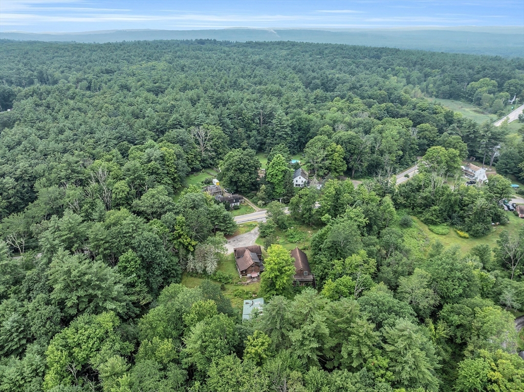147-155 South Road Pepperell, MA 01463 - Photo 16 of 25 a view of a forest with a street