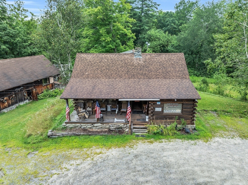 147-155 South Road Pepperell, MA 01463 - Photo 3 of 25 an aerial view of a house having patio and a yard