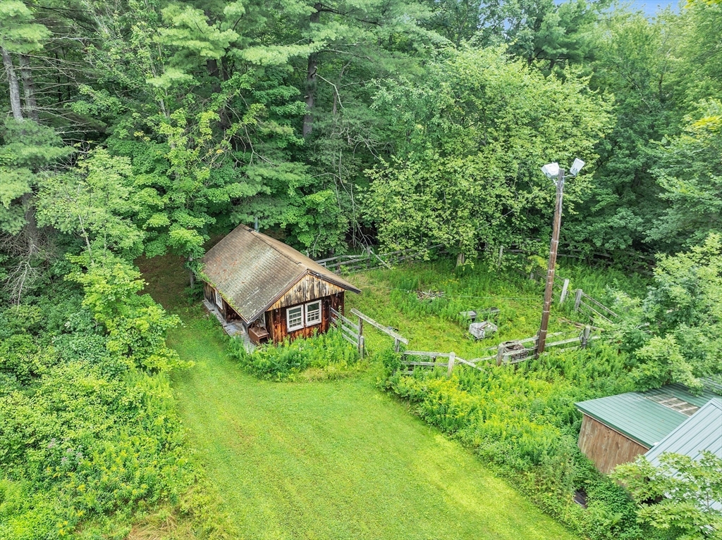 147-155 South Road Pepperell, MA 01463 - Photo 8 of 25 a backyard of a house with lots of green space and fountain