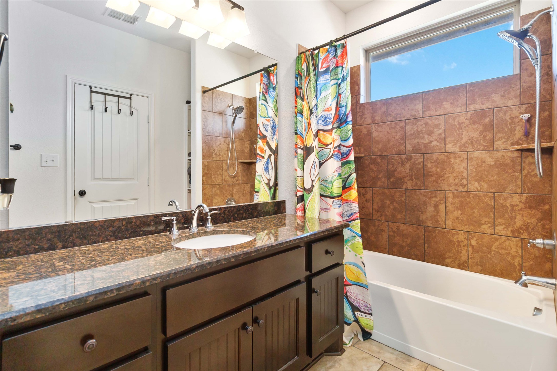 1193 Persimmon Pass Fischer, TX 78623 - Photo 20 of 27 Full primary bathroom featuring vanity, shower / tub combo