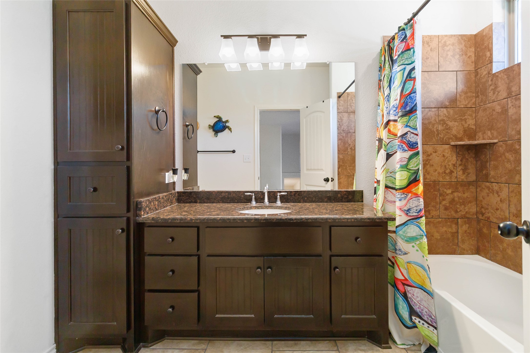 1193 Persimmon Pass Fischer, TX 78623 - Photo 21 of 27 Full primary bathroom with vanity, shower / tub combo