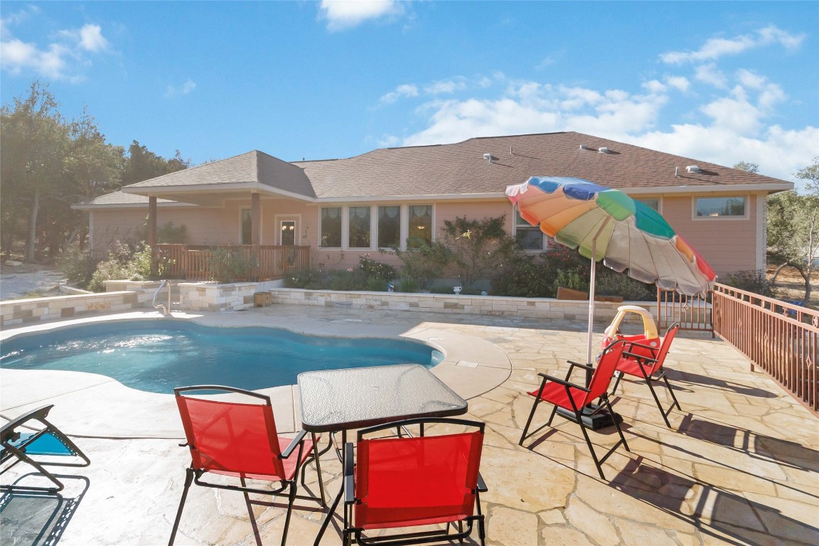1193 Persimmon Pass Fischer, TX 78623 - Photo 22 of 27 View of swimming pool with a covered patio