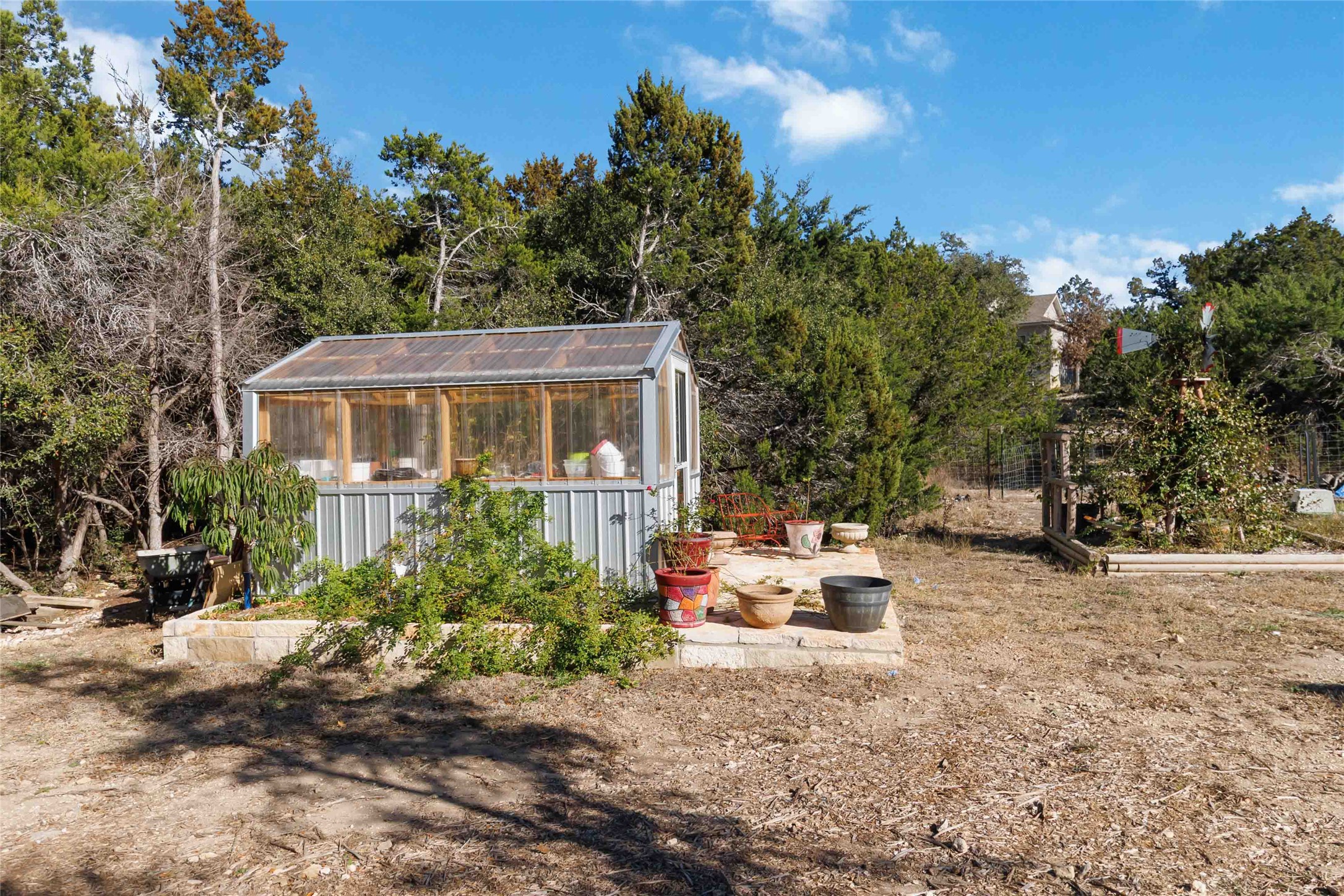 1193 Persimmon Pass Fischer, TX 78623 - Photo 25 of 27 a backyard of a house with yard and outdoor seating