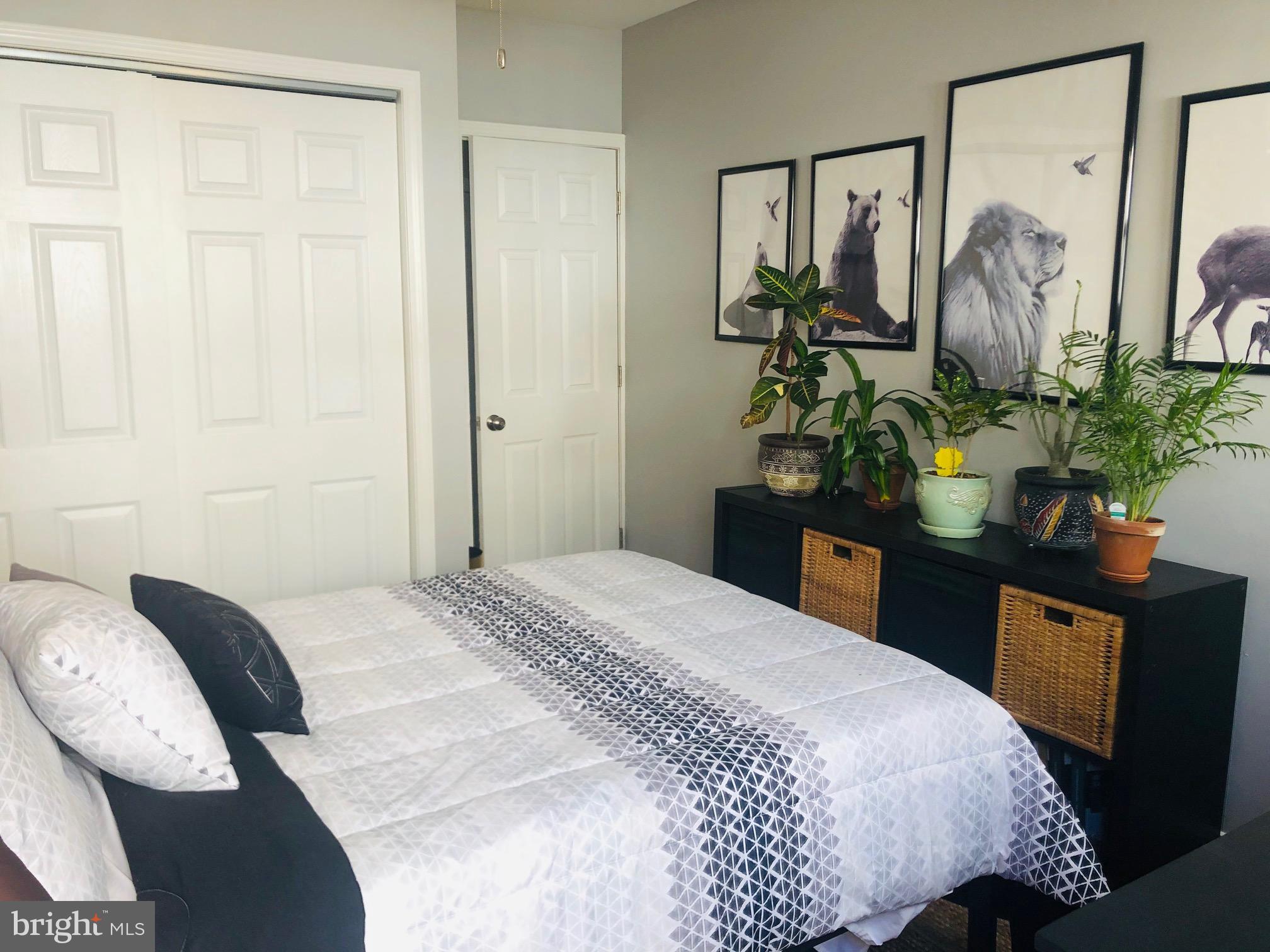 349 Dickinson Street, Unit 1 Philadelphia, PA 19147 - Photo 4 of 11 Serene bedroom with nature-inspired decor.