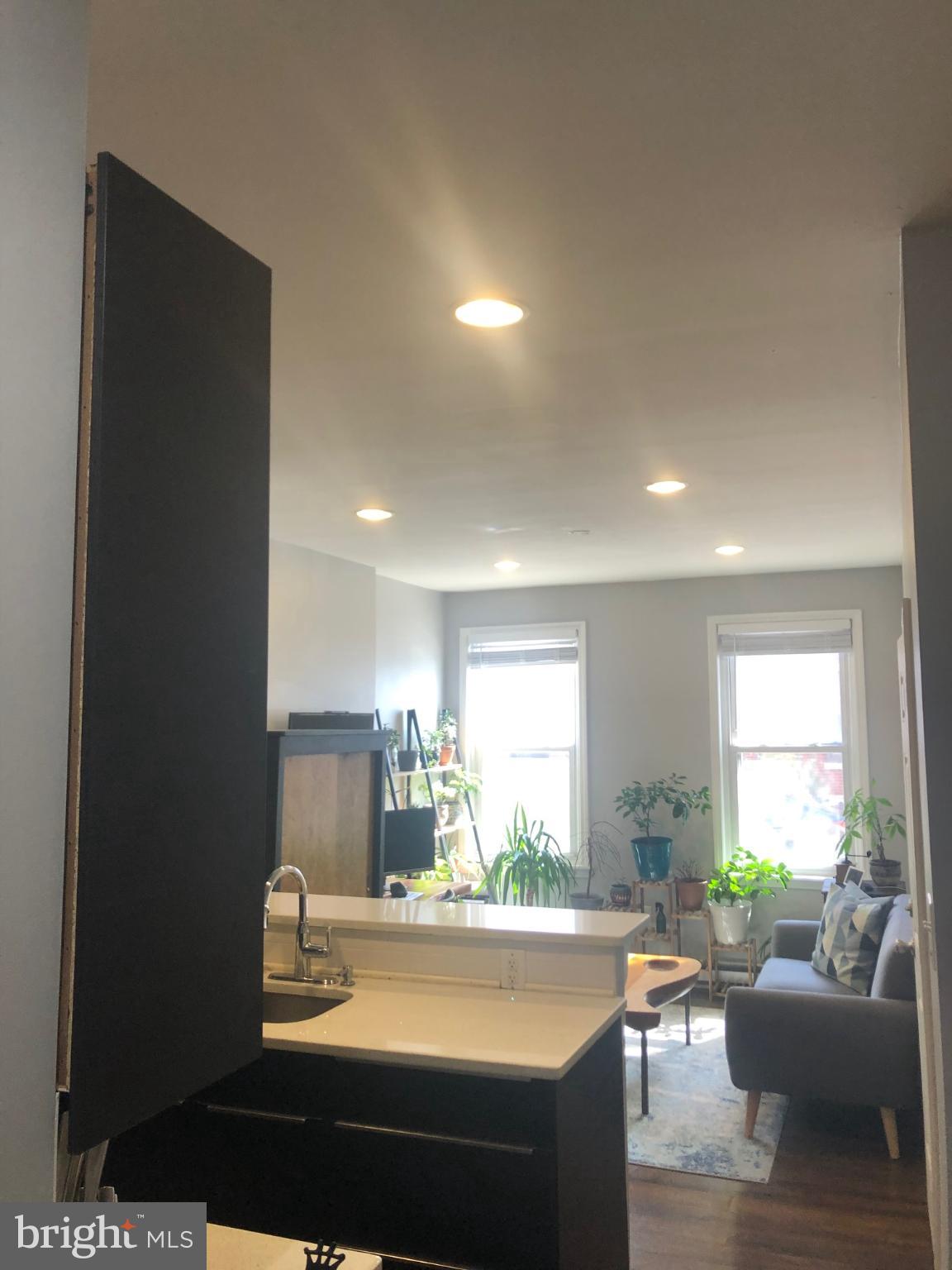 349 Dickinson Street, Unit 1 Philadelphia, PA 19147 - Photo 5 of 11 Bright and inviting urban living space.