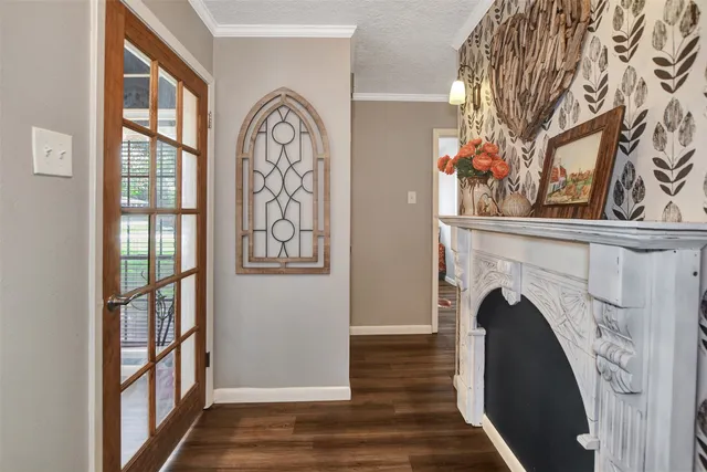 a view of a livingroom with furniture and a fireplace