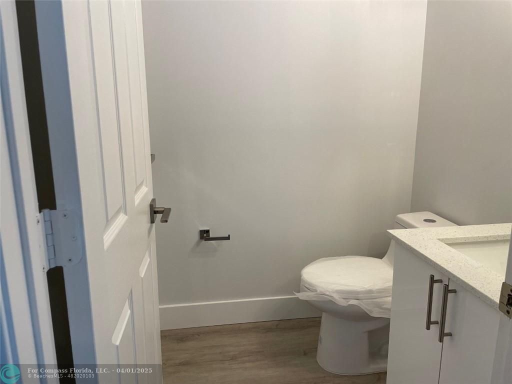 4293 Laurel Ridge Circle Weston, FL 33331 - Photo 14 of 63 a bathroom with a sink and toilet