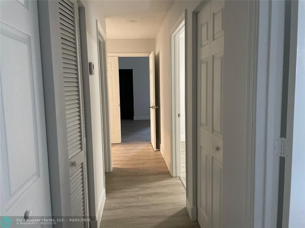 4293 Laurel Ridge Circle Weston, FL 33331 - Photo 17 of 63 a view of a hallway with a hallway
