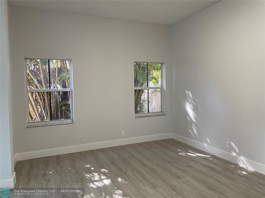 4293 Laurel Ridge Circle Weston, FL 33331 - Photo 45 of 63 an empty room with windows