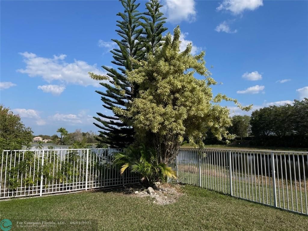 4293 Laurel Ridge Circle Weston, FL 33331 - Photo 61 of 63 a view of a wrought iron fences in front of house