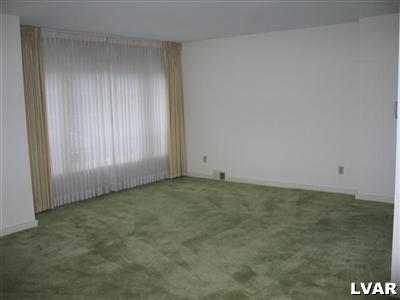 408 East Macada Road Bethlehem, PA 18017 - Photo 6 of 7 living room has hardwood under carpeting